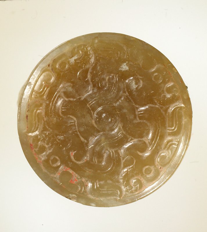Cylindrical Button-like Object, one of a pair