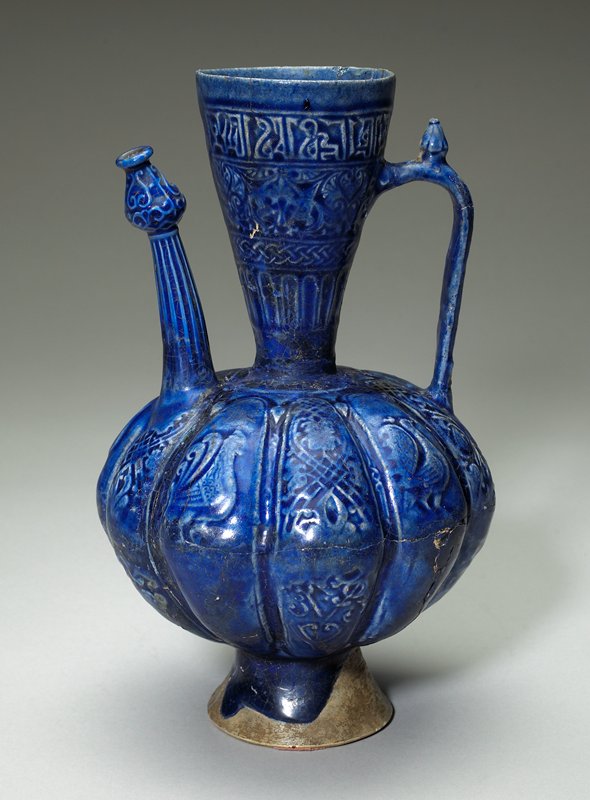 Ewer with bird, vegetal, and calligraphic motifs