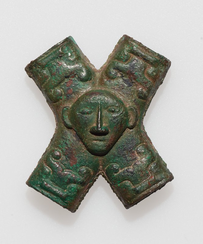Cross-tube with Human Head Mask
