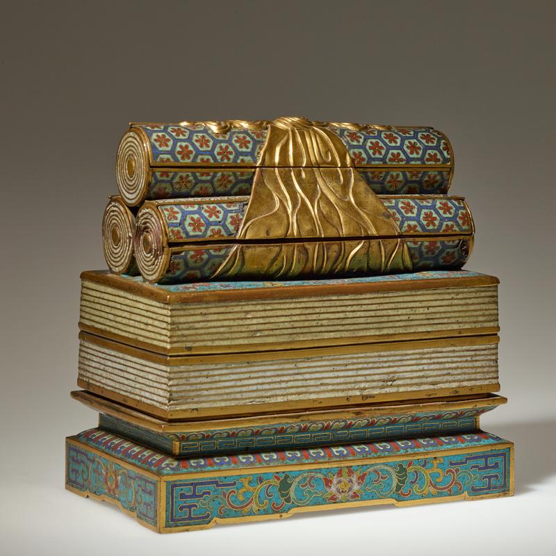 Box in the form of books and scrolls