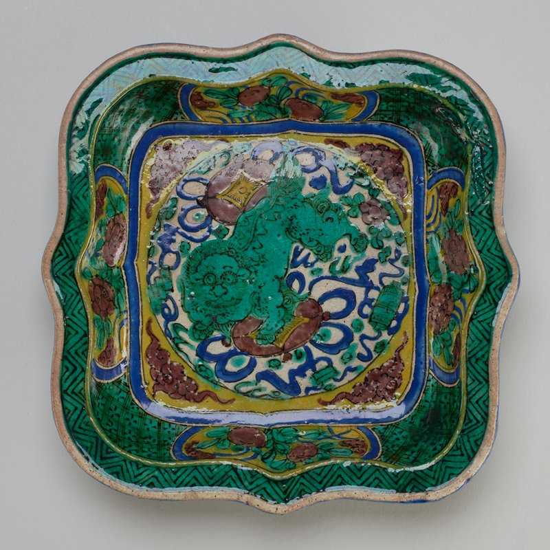 Plate with design of Chinese lion