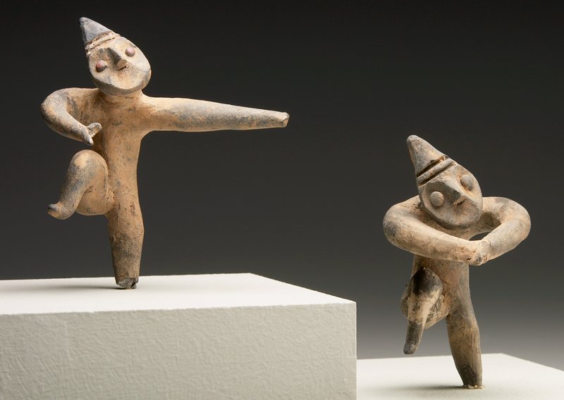 Dancing figure, one of a pair