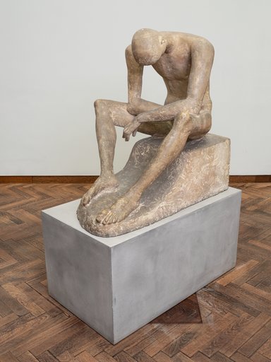 Sitzender Jüngling