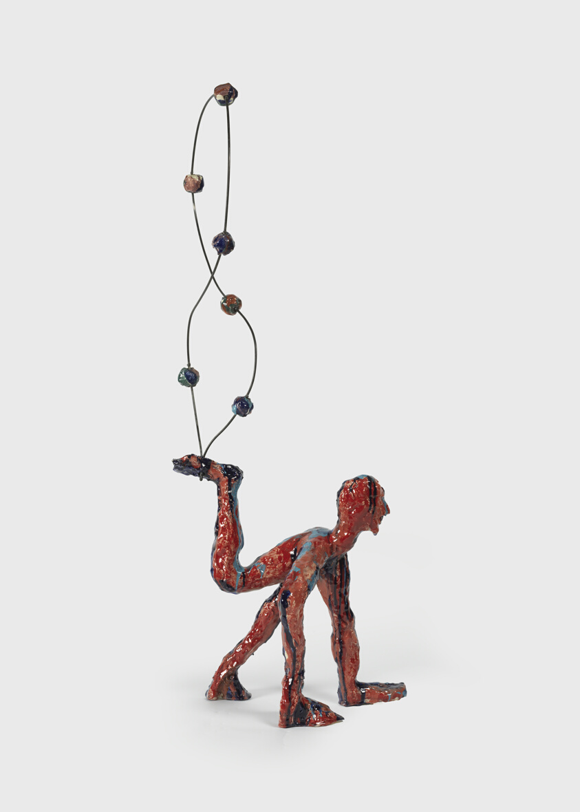 acrobat juggling six balls by moonlight